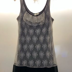 Pretty ivory lace detail dress length…26 inches. Made in Indonesia